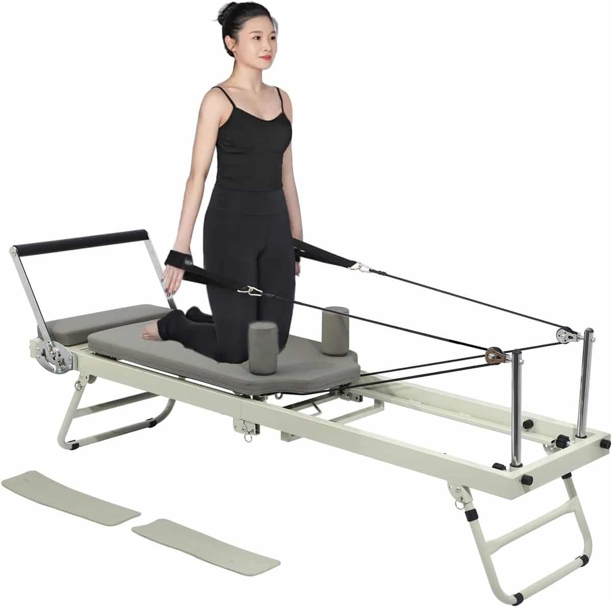 Test de la machine réformateur de pilates pliable pour la maison